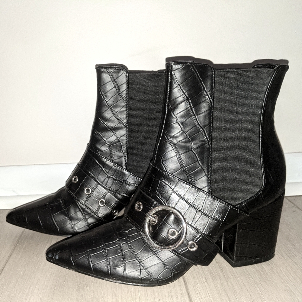 Black booties with buckle detail